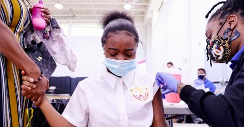 Girl getting a COVID-19 vaccine