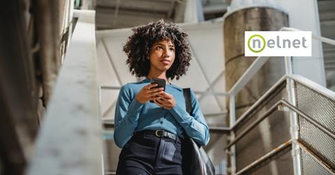 A woman using her smartphone and the Nelnet logo
