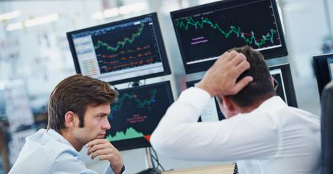 Traders discussing the stock market