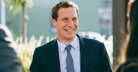 Mat Ishbia smiling in suit and tie.