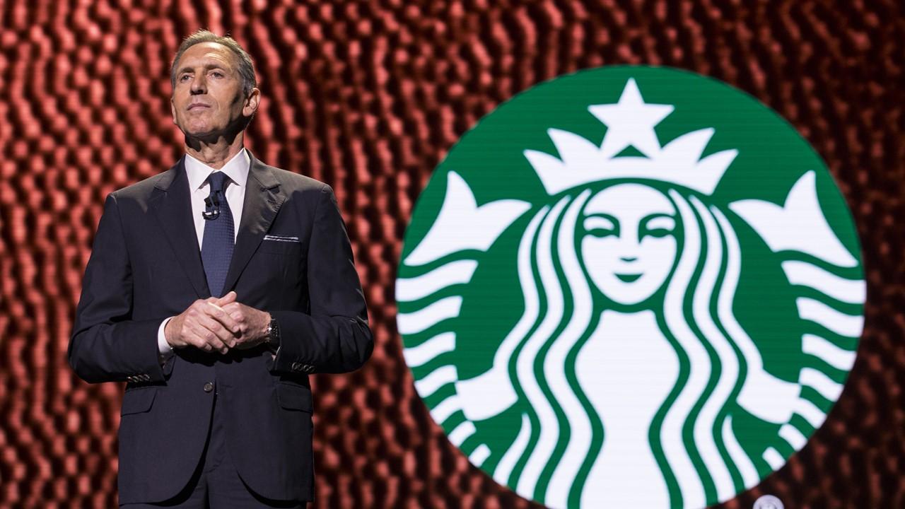 Howard Schultz and the Starbucks logo