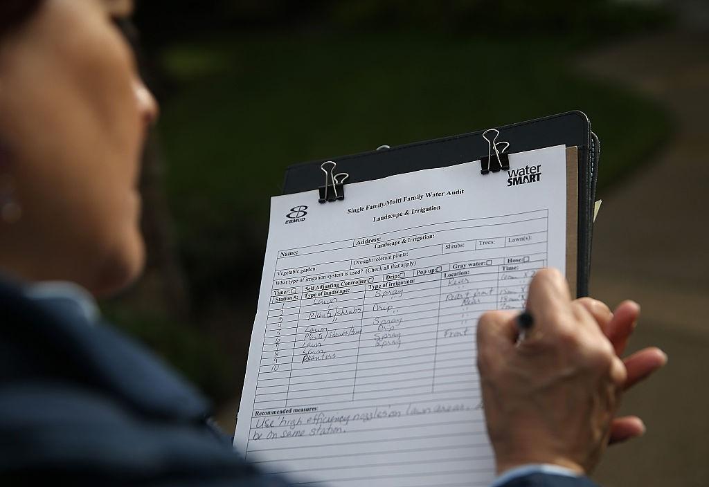 A water inspector monitors water usage