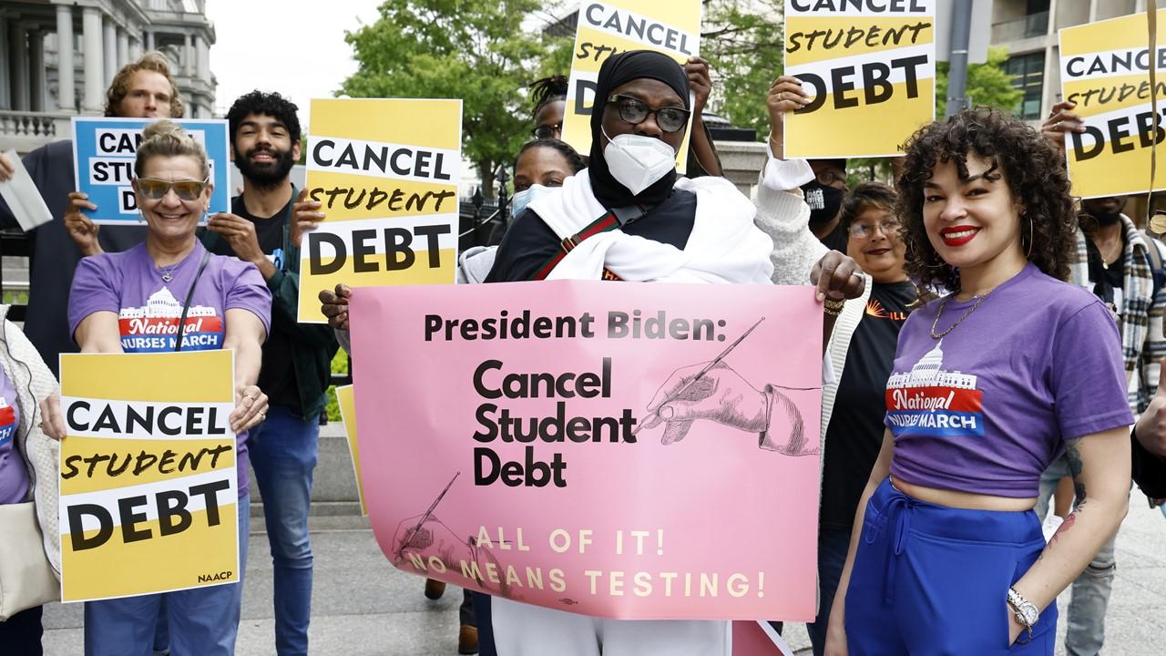 People at a student debt cancelation march