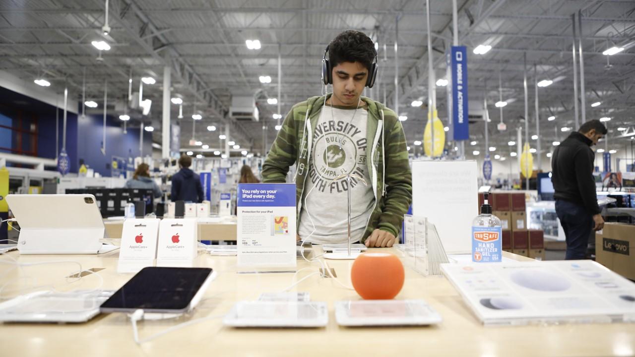 People shopping in a Best Buy store