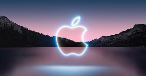 Apple logo over a lake