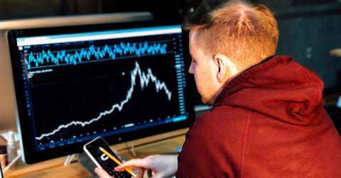 Trader looking at stock charts