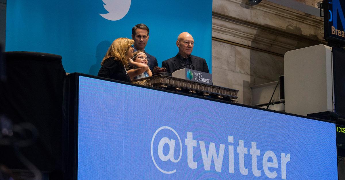 Twitter users, including actor Patrick Stewart (R), rings the opening bell at the New York Stock Exchange (NYSE) while also celebrating Twitter's IPO on November 7, 2013 in New York City.