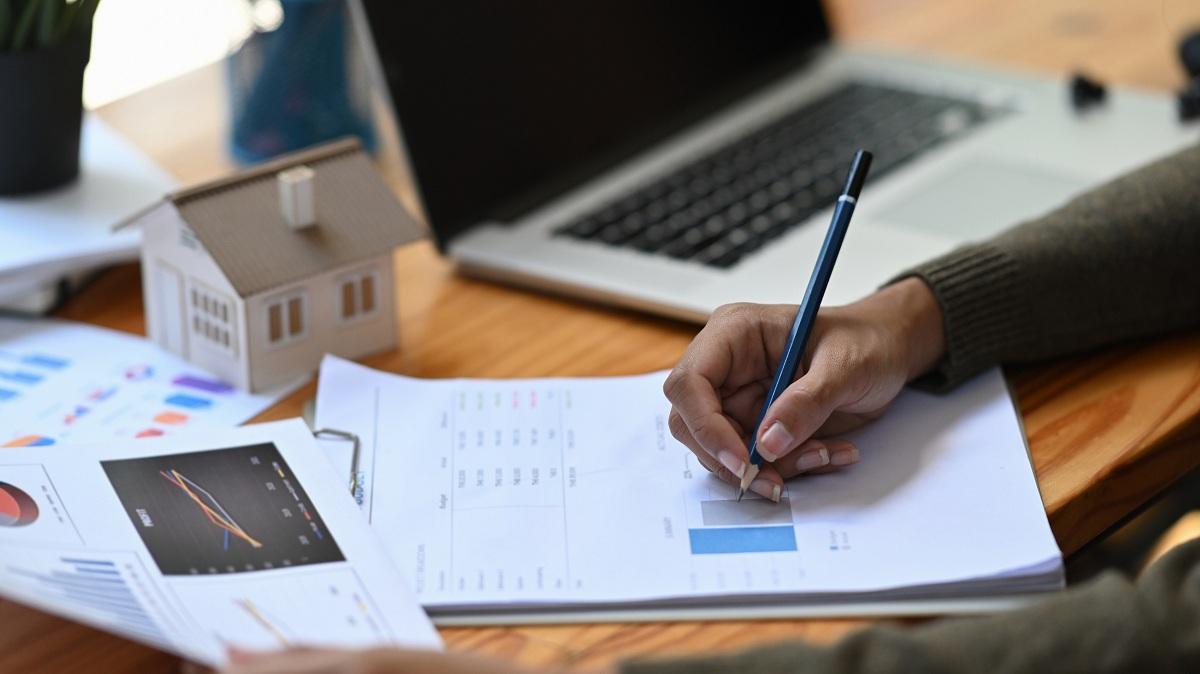 A woman looking at stock data