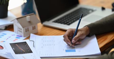 A woman looking at stock data