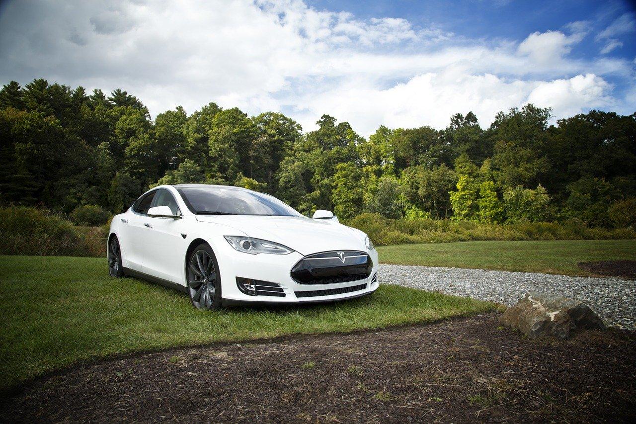 wedbush upgrades tesla price target