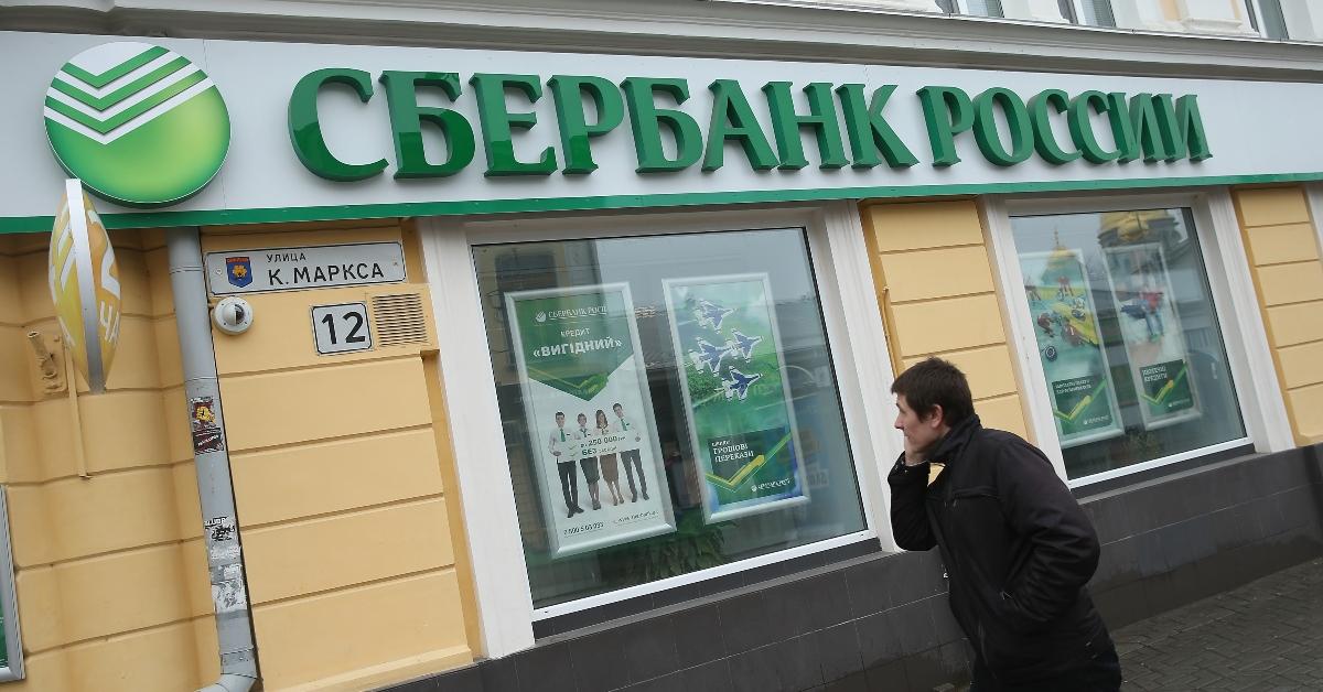 A person walking in front of a Sberbank location