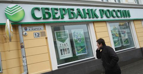 A person walking in front of a Sberbank location