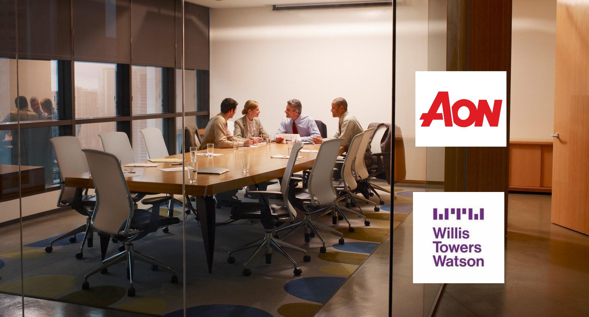 Aon Willis Towers Watson logos over deal meeting