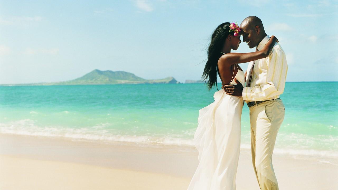 A married couple on a beach