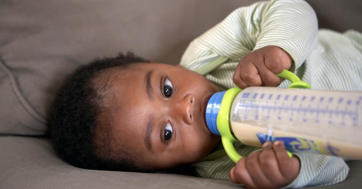 A baby drinking from a bottle