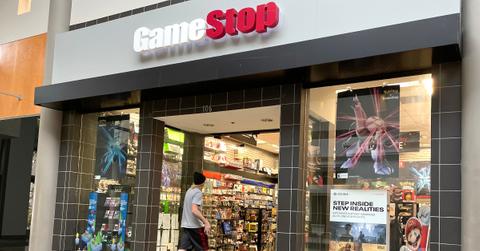 A customer enters a GameStop store