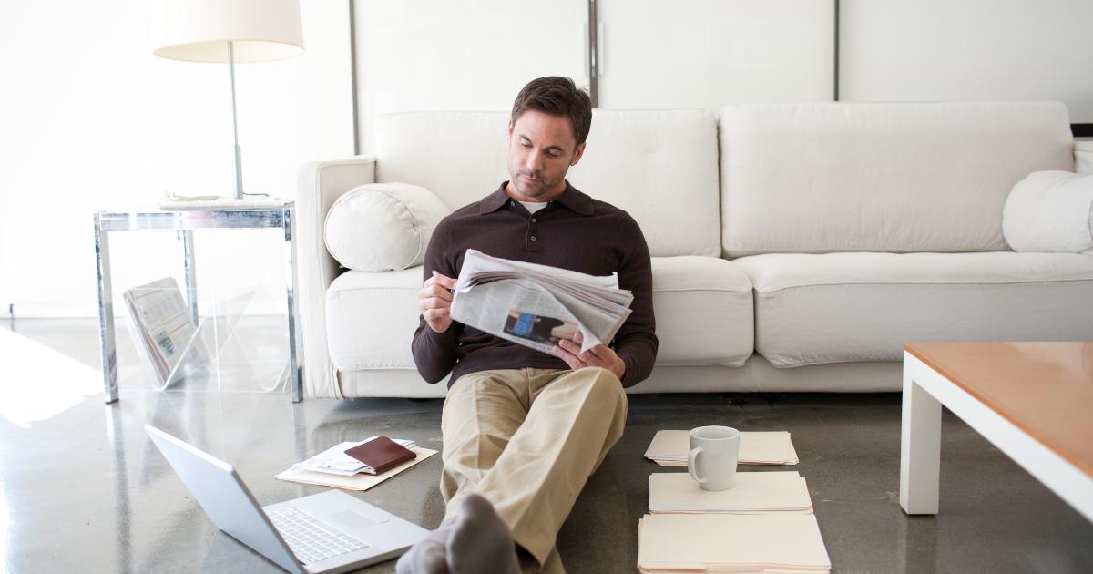 Investor looking at paper