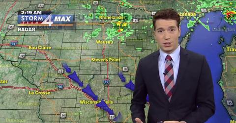 A meteorologist discussing the weather forecast