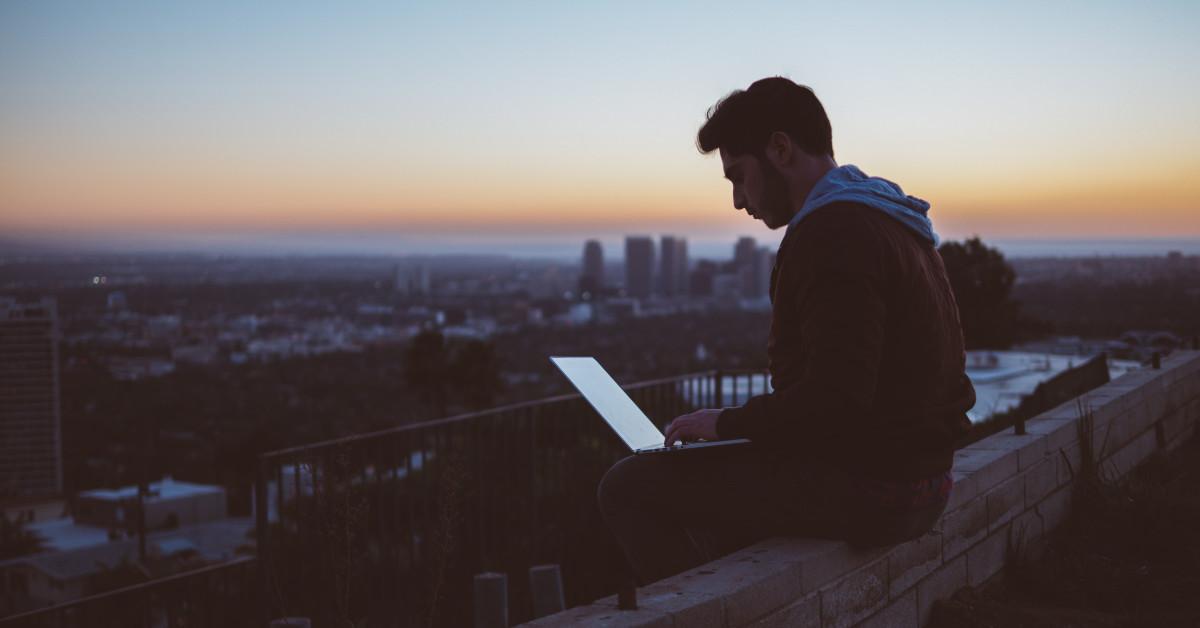 man working on computer