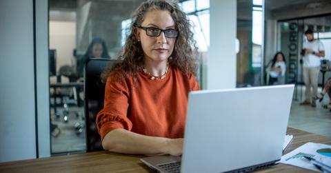 A woman working on a laptop