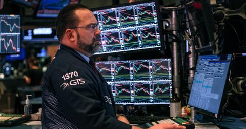 Trader looks at stock quotes