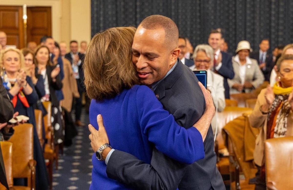 Nancy Pelosi congratulating Hakeem Jeffries on his selection to lead House Democrats. 