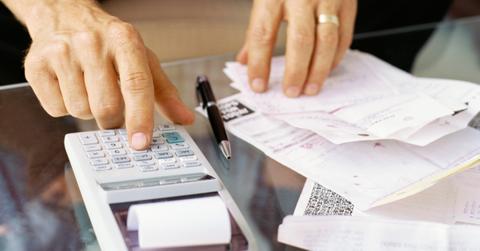 Man calculating taxes