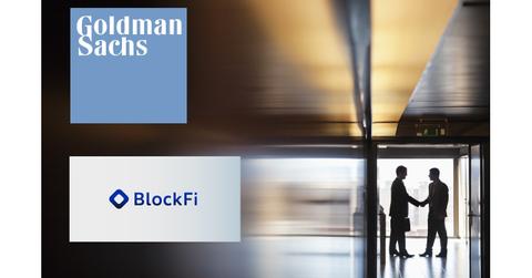 BlockFi Goldman Sachs logos over people making deal