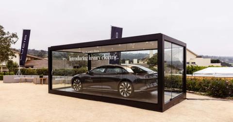 Lucid Air in a glass container