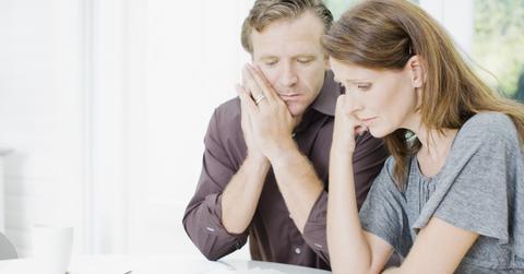 A couple discussing debt