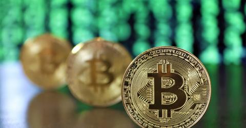 Bitcoins on a wooden table