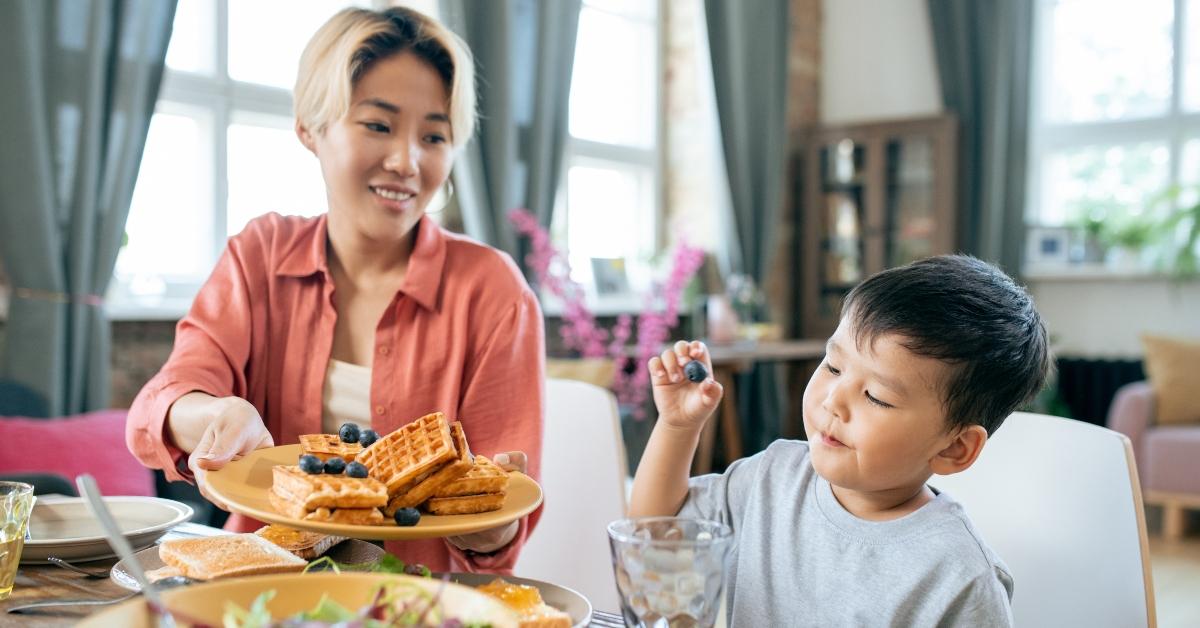 A family eating waffles