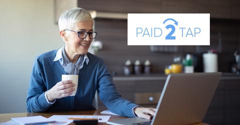 Woman looking on a laptop and Paid2Tap logo