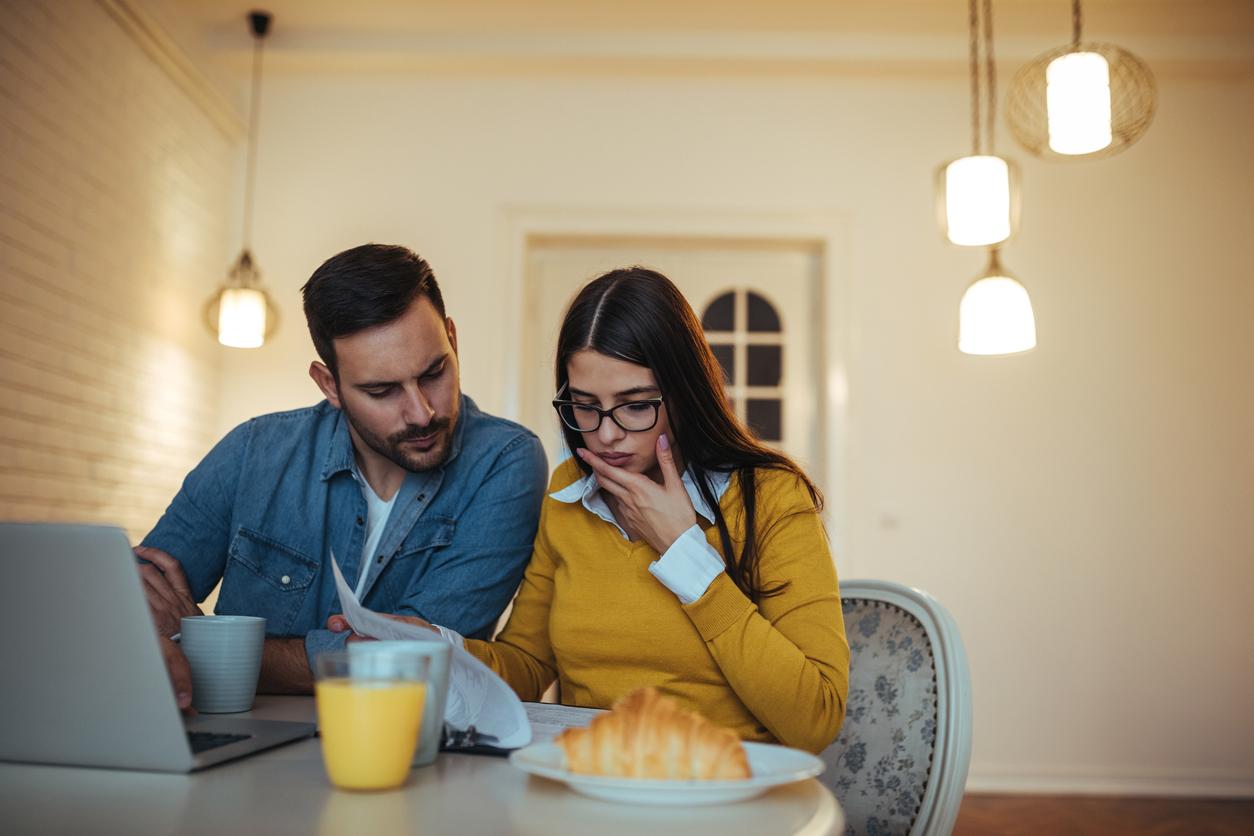 A couple looking over paperwork 