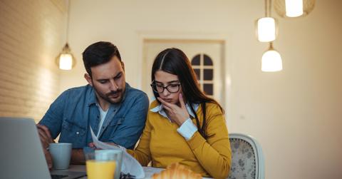 A couple looking over paperwork