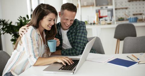 A couple looking at their property taxes