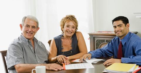 A couple consulting with a financial planner
