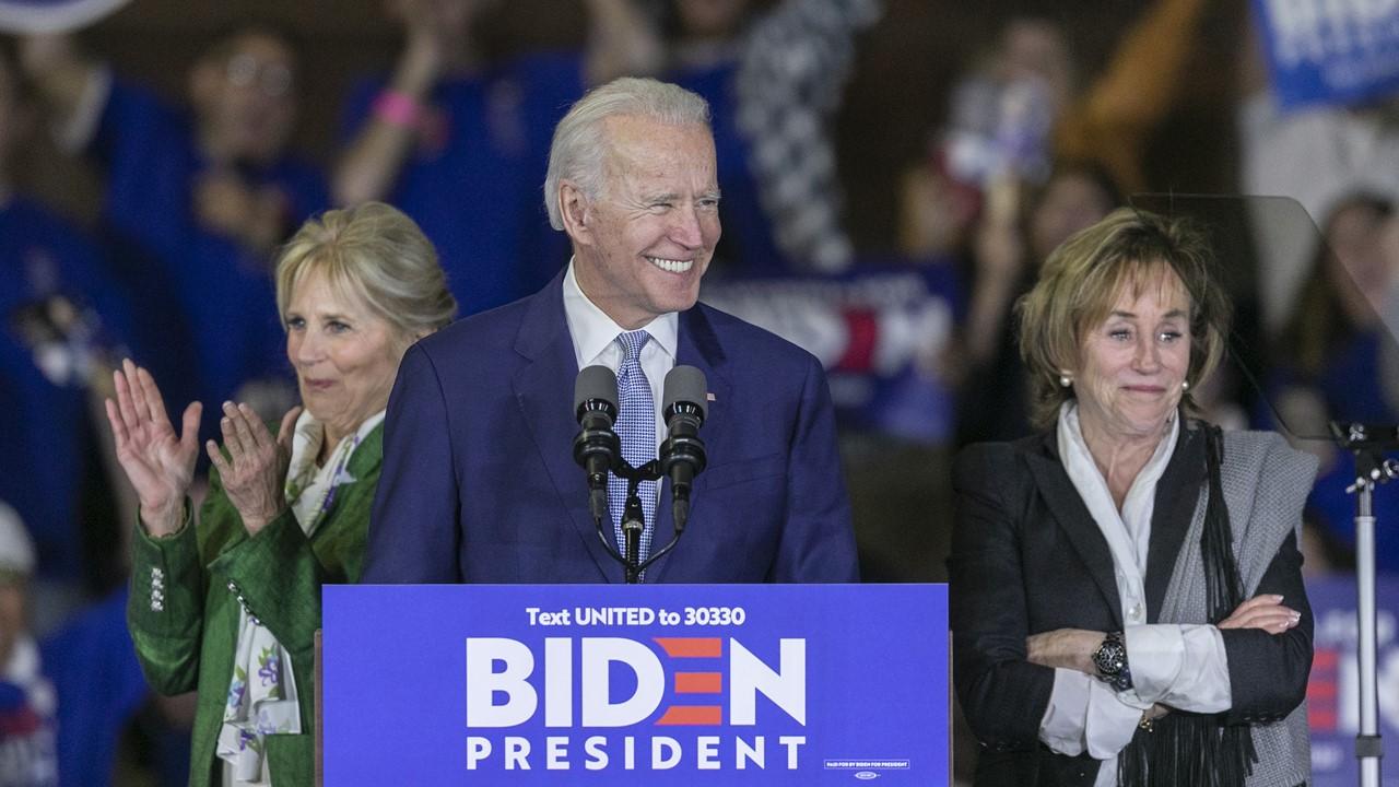 Valerie Biden Owens standing to the right of Joe Biden