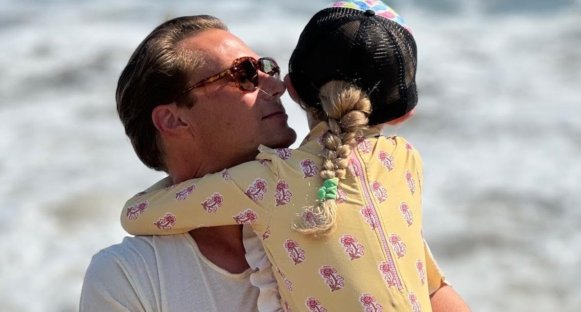 Kris Hamburger with his daughter