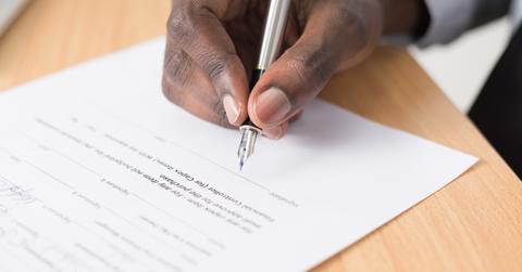 A person signing document