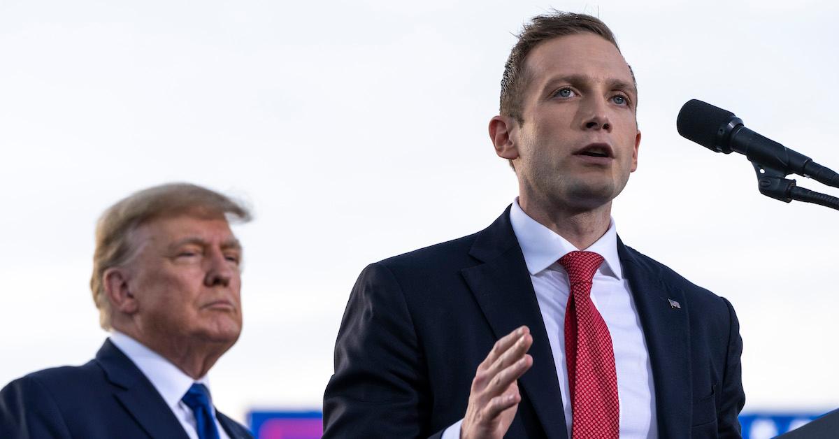 Trump looks on as Ohio congressional hopeful Max Miller speaks at a rally in Delaware, Oho.