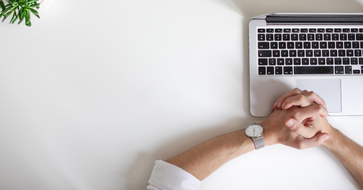 person waiting for their computer to load