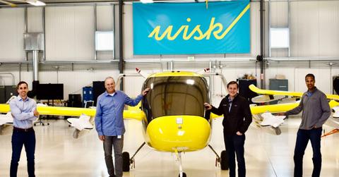 Wisk Aero employees with aircraft