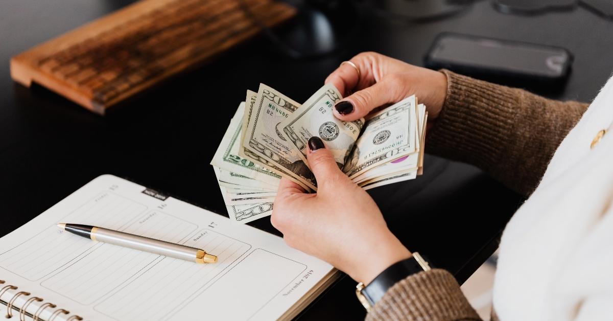 woman holding money