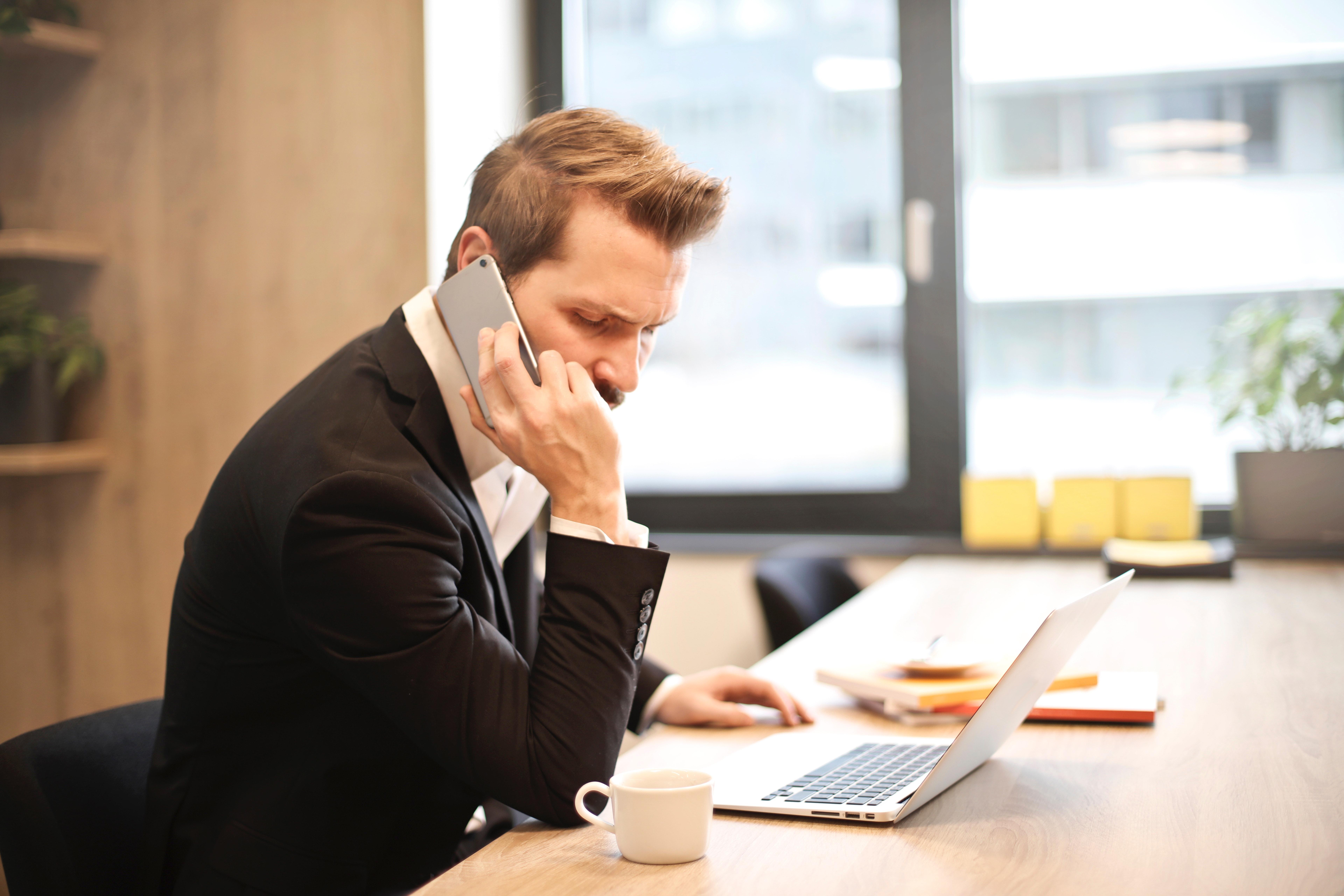 A person answers a phone call