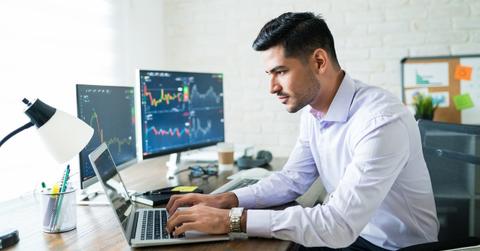 Investor looking on a laptop