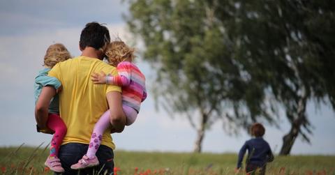 A man with three children