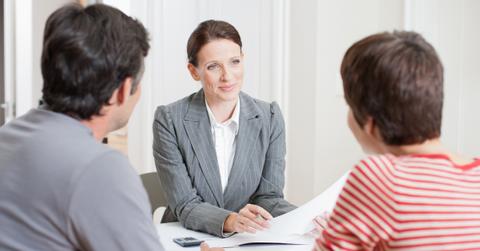 Couple discussing I bonds with a financial advisor