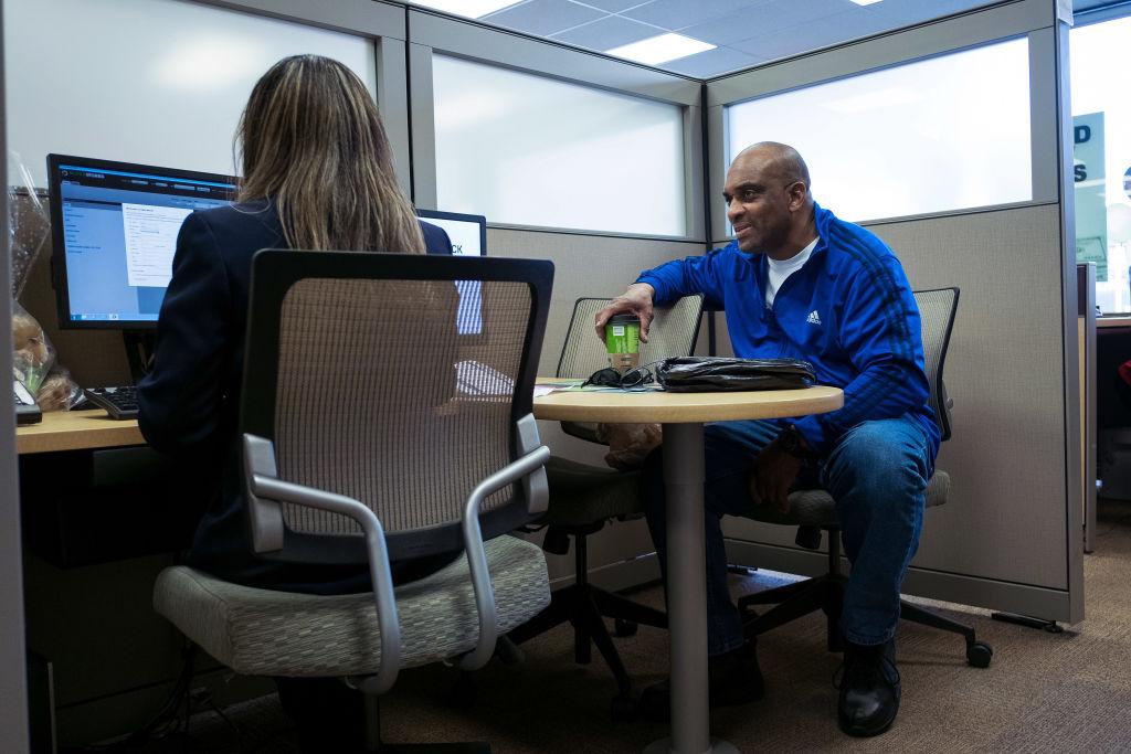 Two people working at a desk