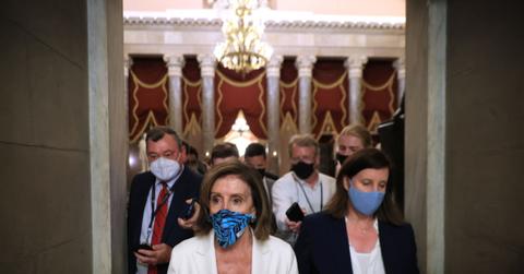 Speaker of the U.S. House, Nancy Pelosi, prepares for House debate on the infrastructure and budget reconciliation bills.